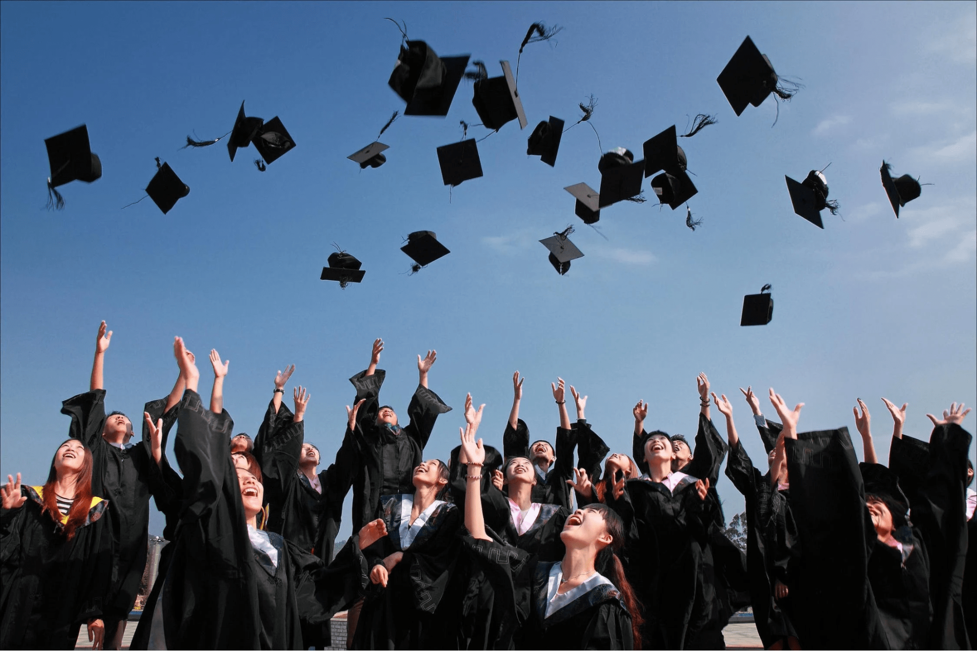 Throwing Caps in the Air Graduation Photoshoot Idea