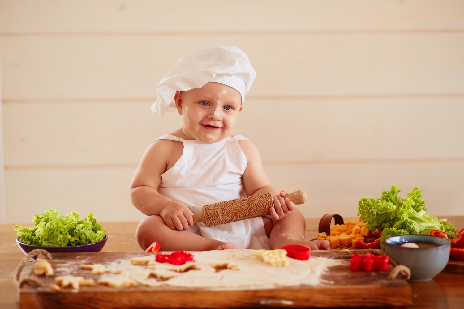 Cute little chef-themed newborn baby photoshoot capturing culinary cuteness