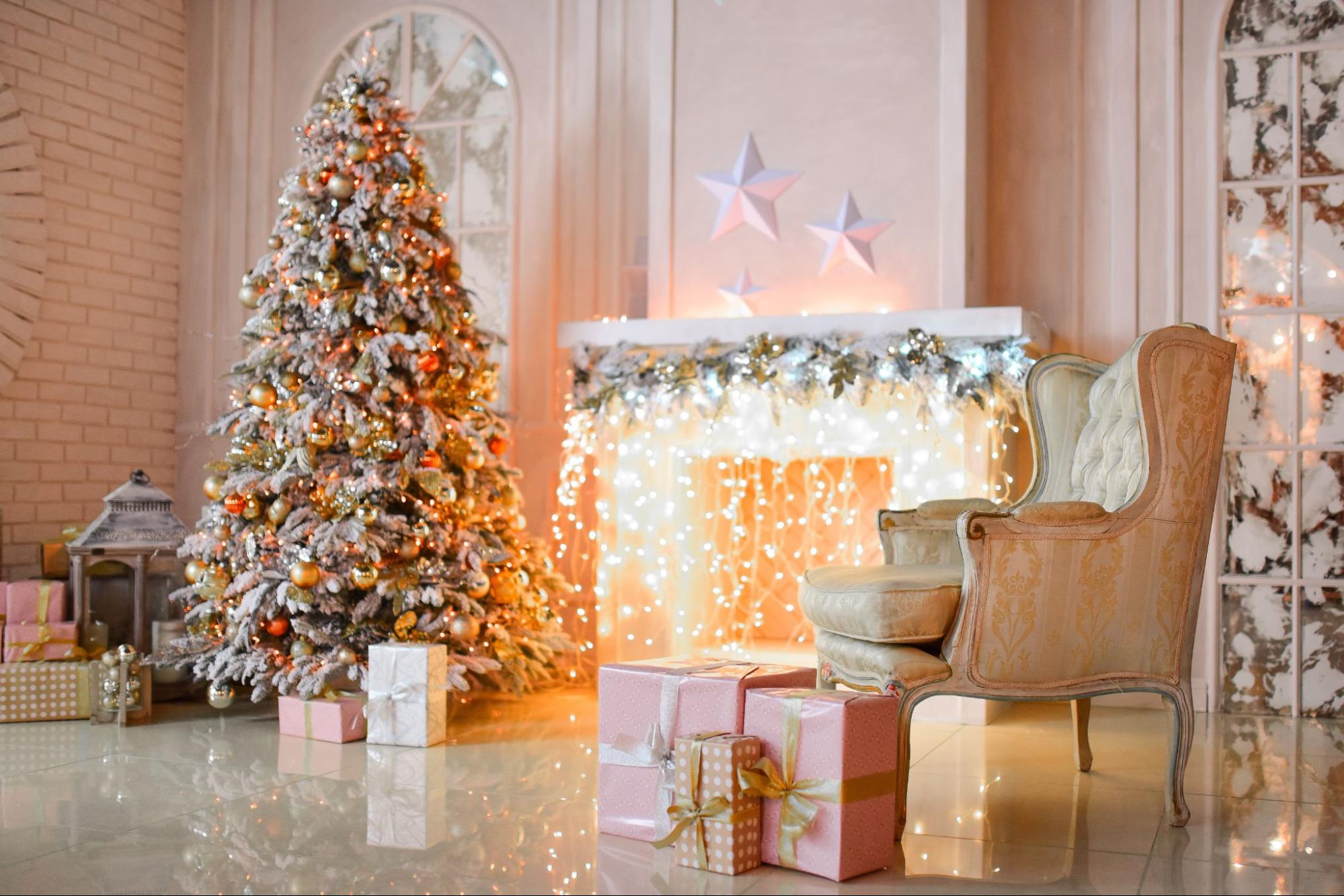 Christmas decor in living room with fireplace and gifts, perfect for holiday gatherings