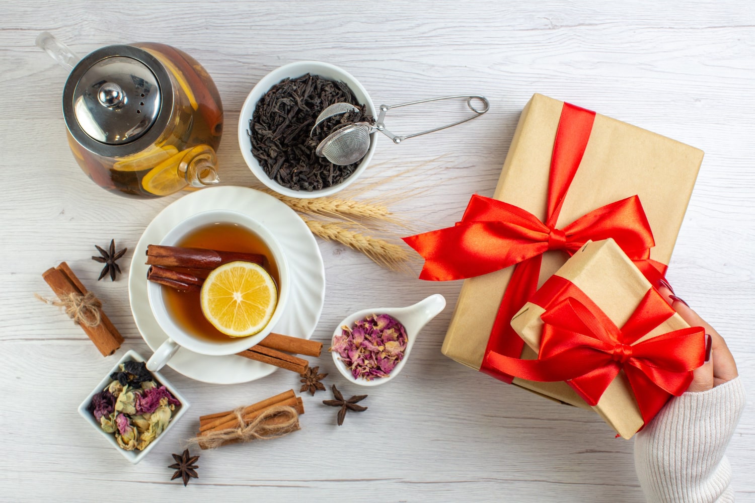 Celebrating Chinese New Year, a woman's hands hold an elegantly wrapped gift, hinting at the delightful surprise inside.