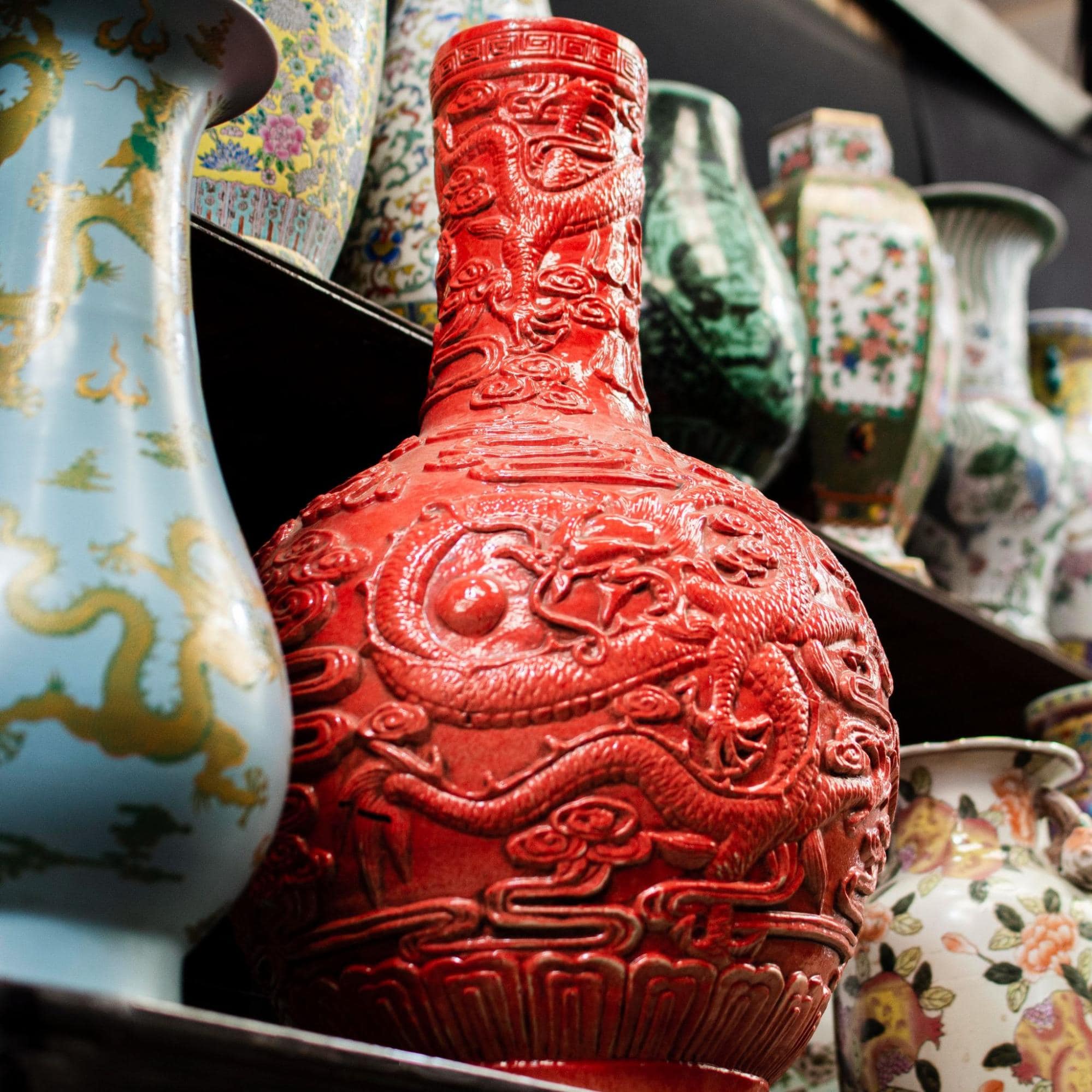 Chinese New Year gifts feature hand-painted ceramic vases with dragon designs, showcasing exceptional artistry.