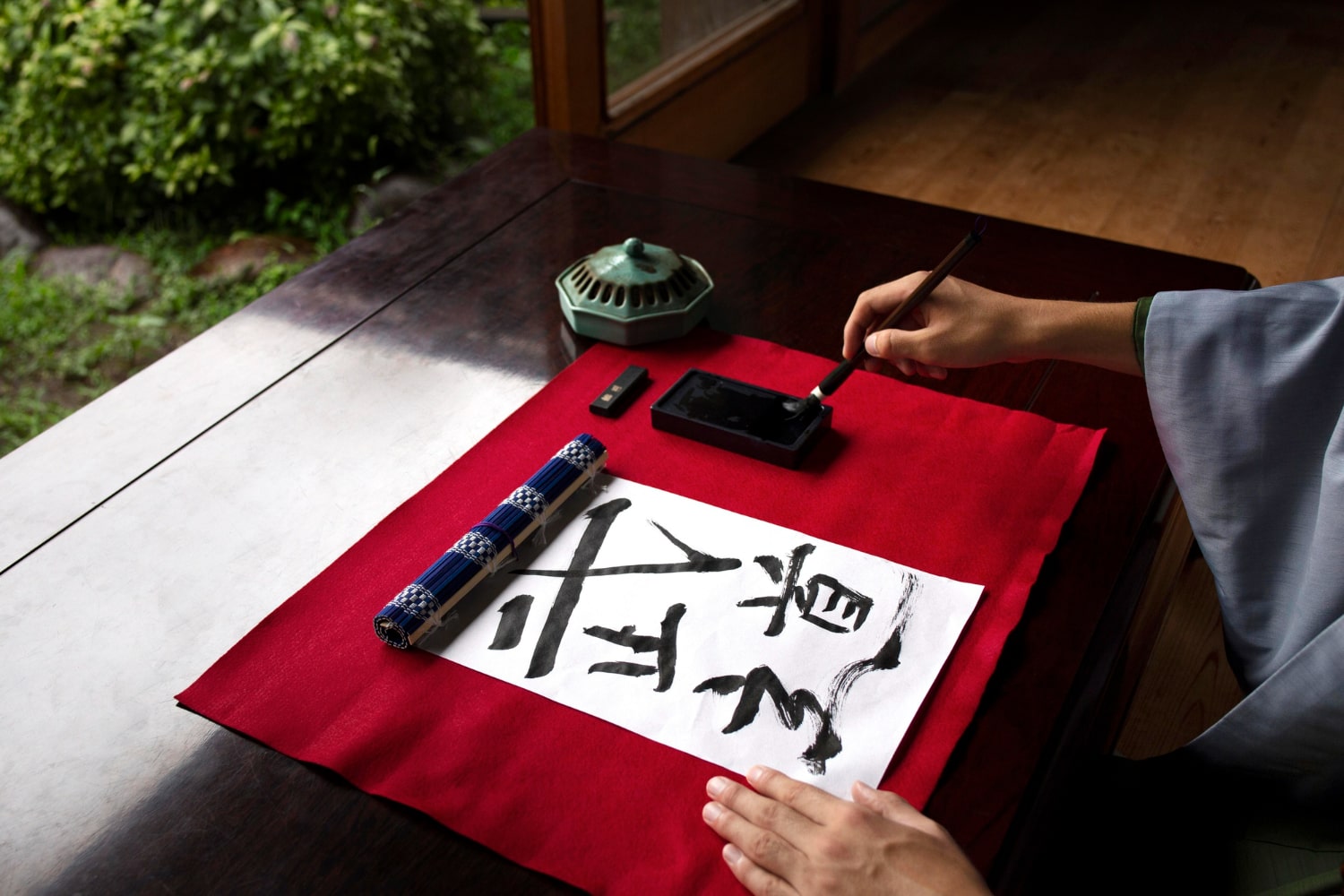 Celebrate Chinese New Year with elegant Calligraphy Sets, writing beautiful characters on paper.