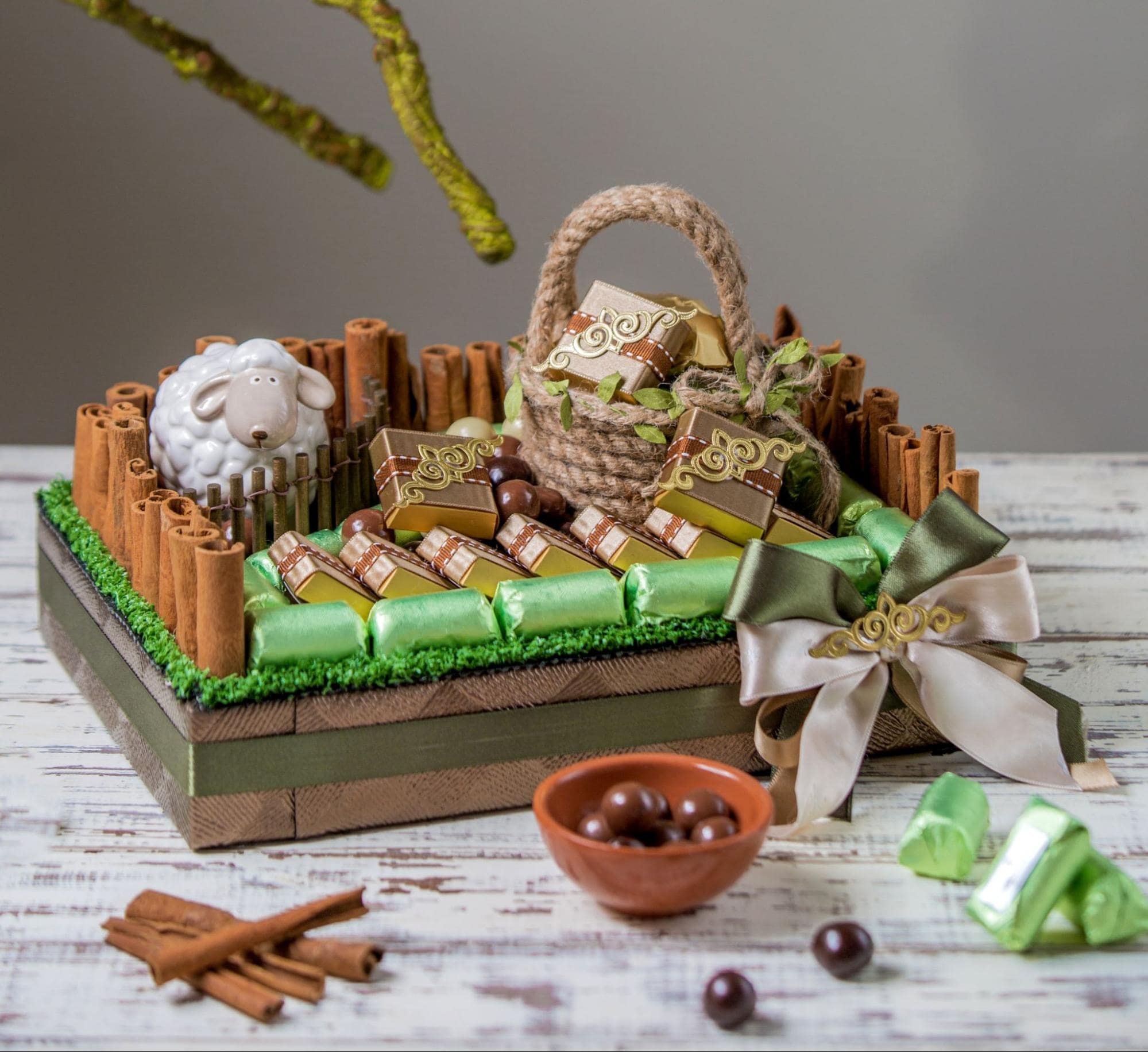 Mouthwatering chocolates and candies elegantly presented on a wooden tray—a perfect choice for Chinese New Year gifts.