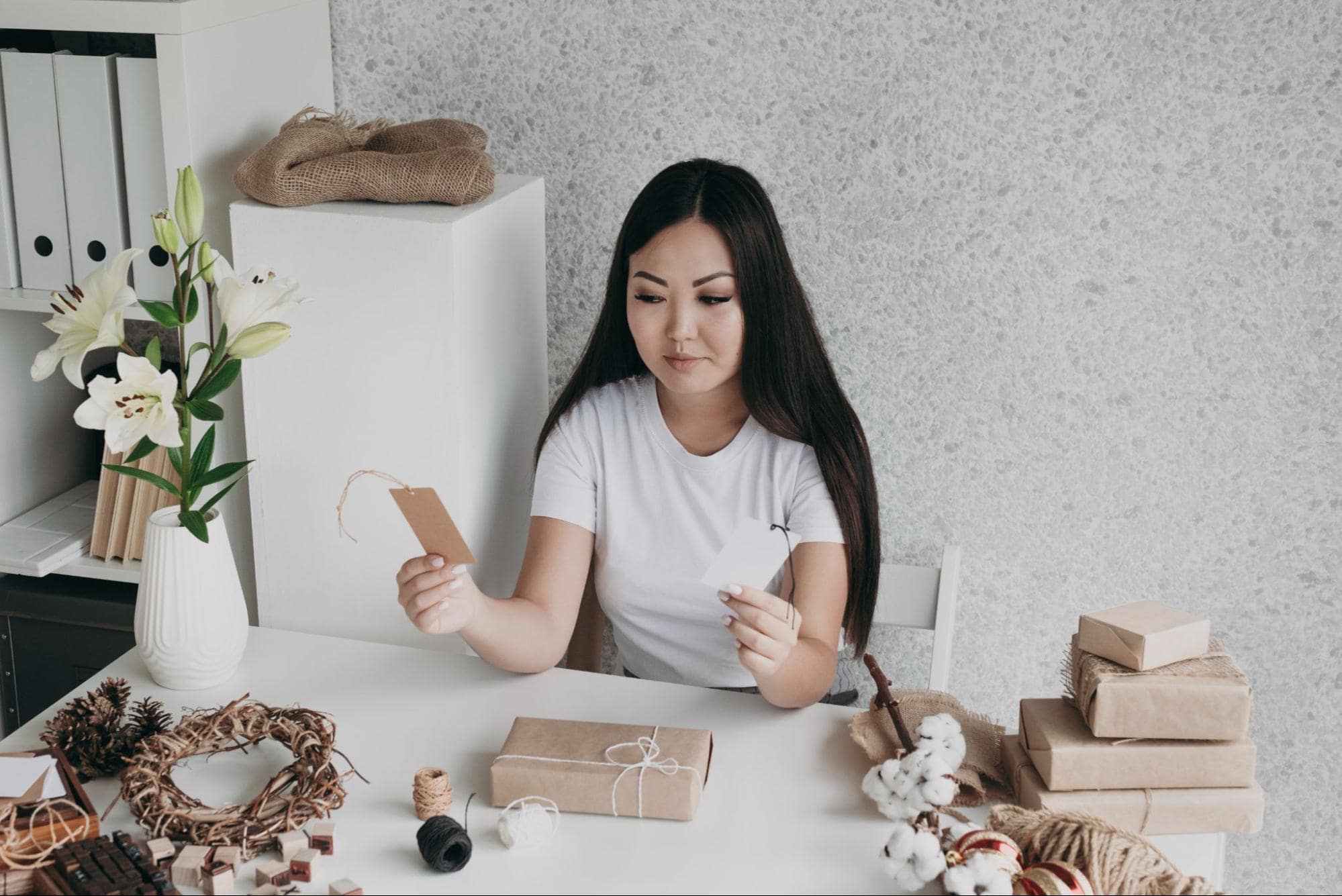 Woman crafting handmade gifts, thoughtful for a girlfriend's birthday