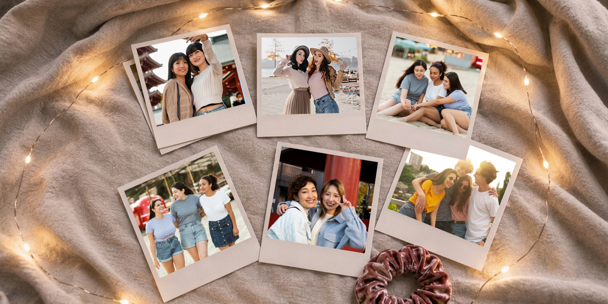 Retro friendship photo prints with happy memories arranged under warm fairy lights